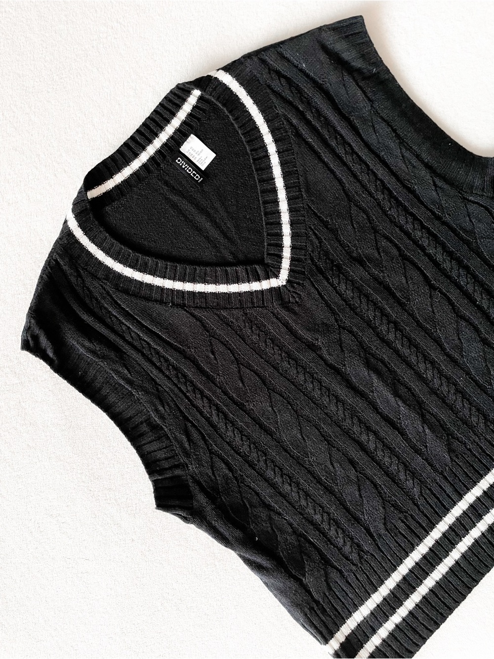 Divided Black Cable-Knit V-Neck Sweater Vest with White Trim